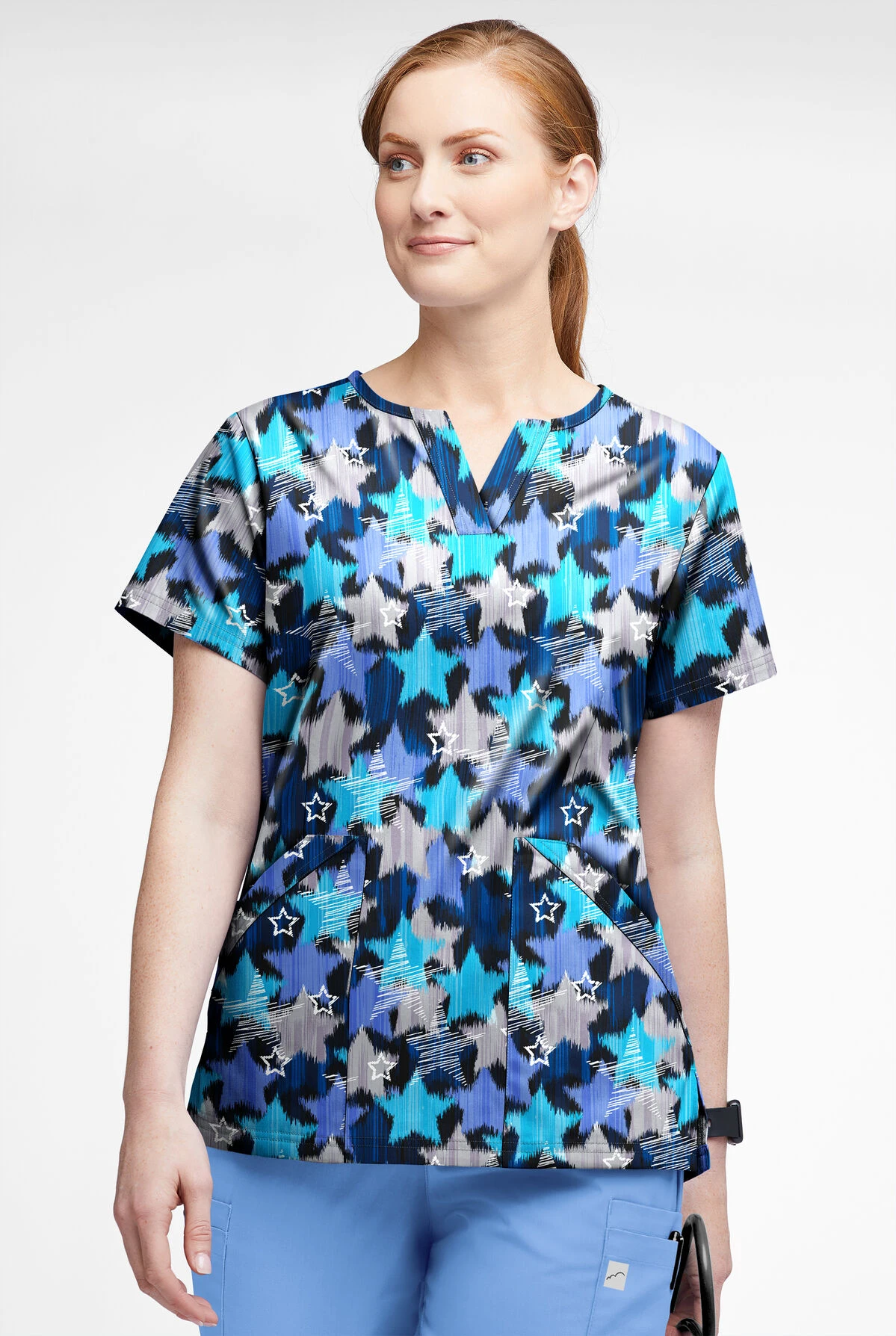 Butter-Soft Shining Stars Women’s 4-Pocket V Notch-Neck Printed Scrub Top - Image 2